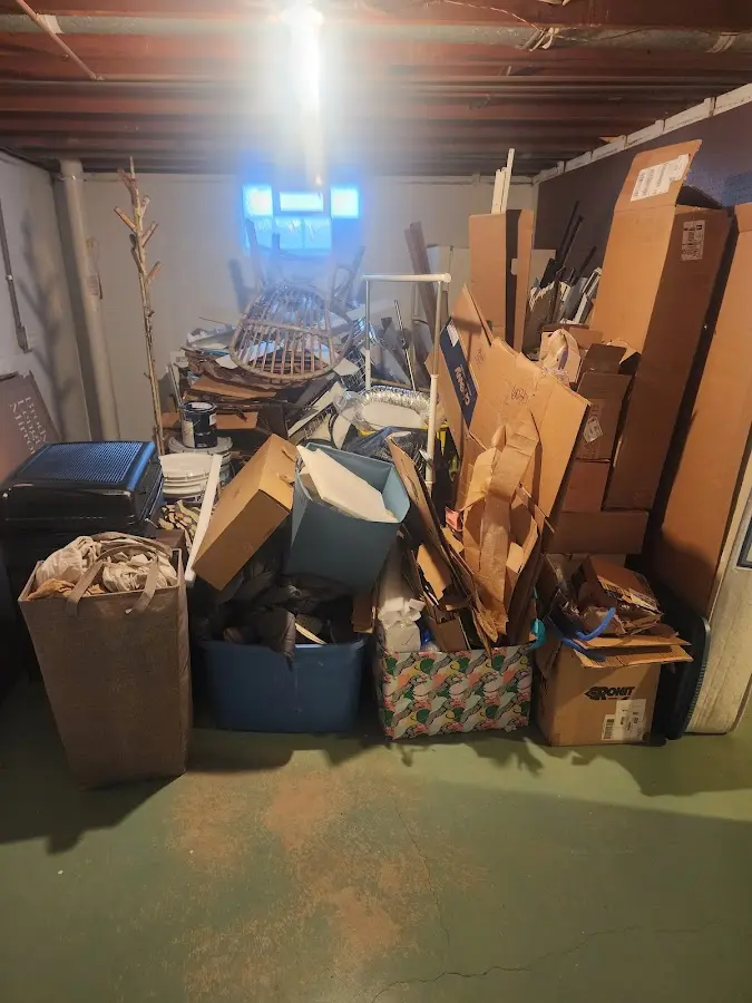 Roll-off dumpster container at job site for Concrete Dumpster Rental in Morrisville